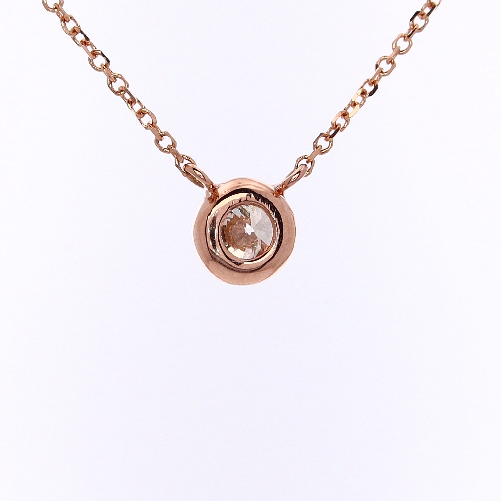 Elegant 14 Karat Rose Gold Solitaire Diamond Pendant with Cable Chain Necklace - A Timeless Jewelry Piece