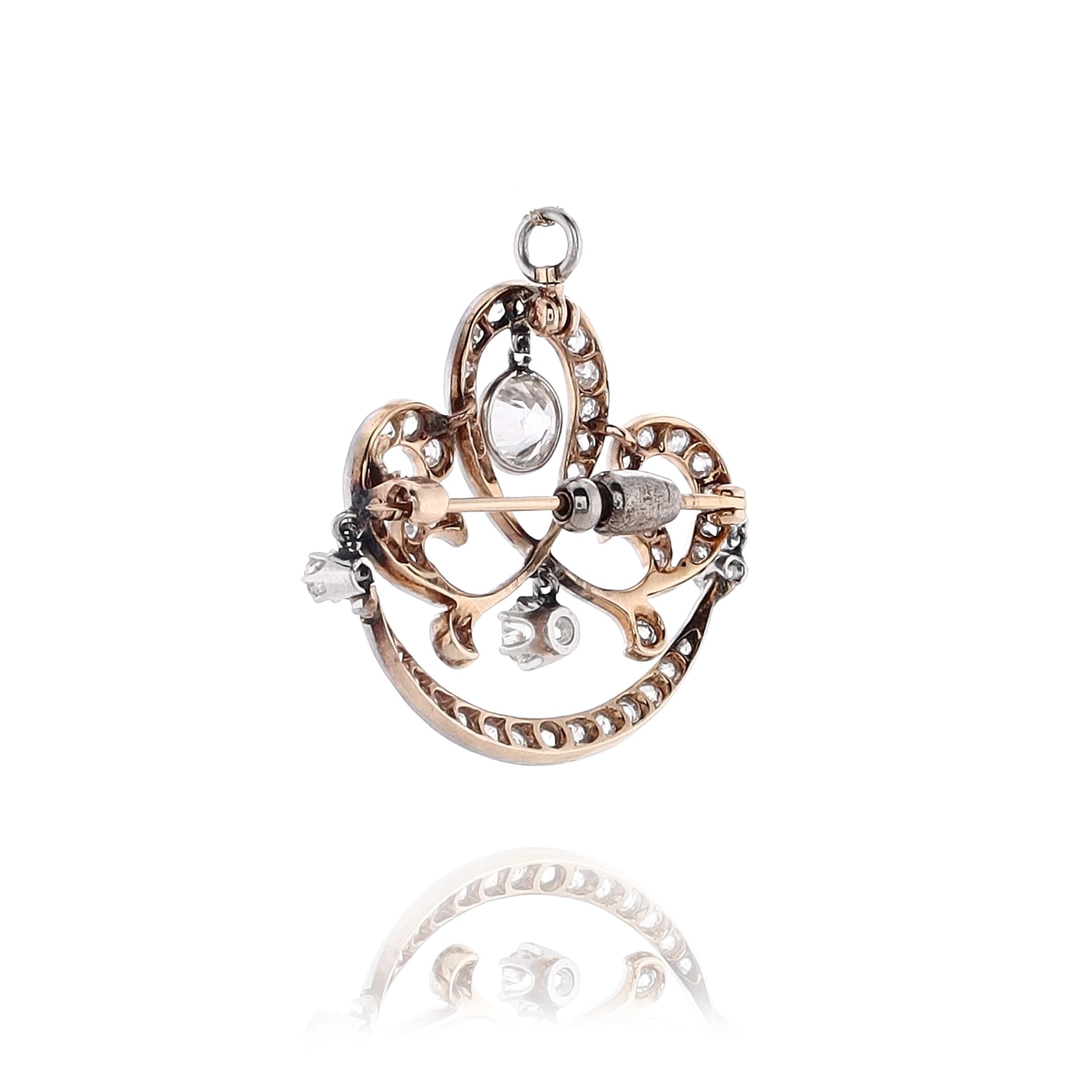 Elegant Estate 14 Karat Yellow Gold and Platinum Scroll Design Diamond Brooch for Fashion Accessorizing