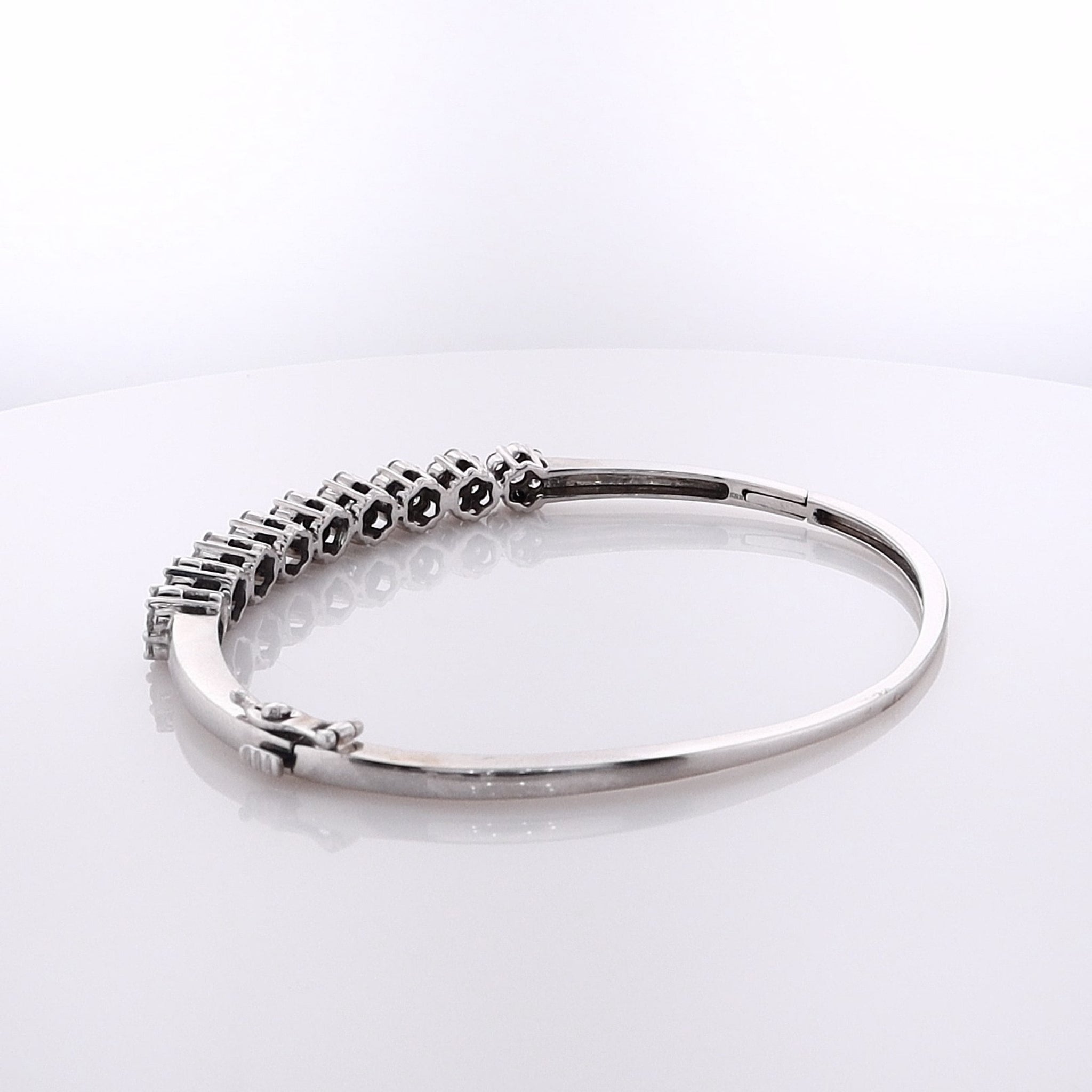 14 Karat White Gold Elegant Hinged Diamond Bangle Bracelet for Timeless Style