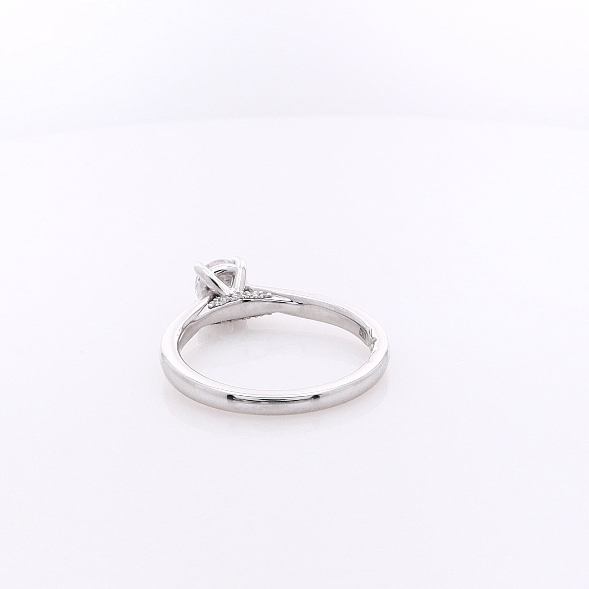 Estate A Jaffe Exquisite 18 Karat White Gold Single Cubic Zirconium and Diamond Under Gallery Engagement Ring