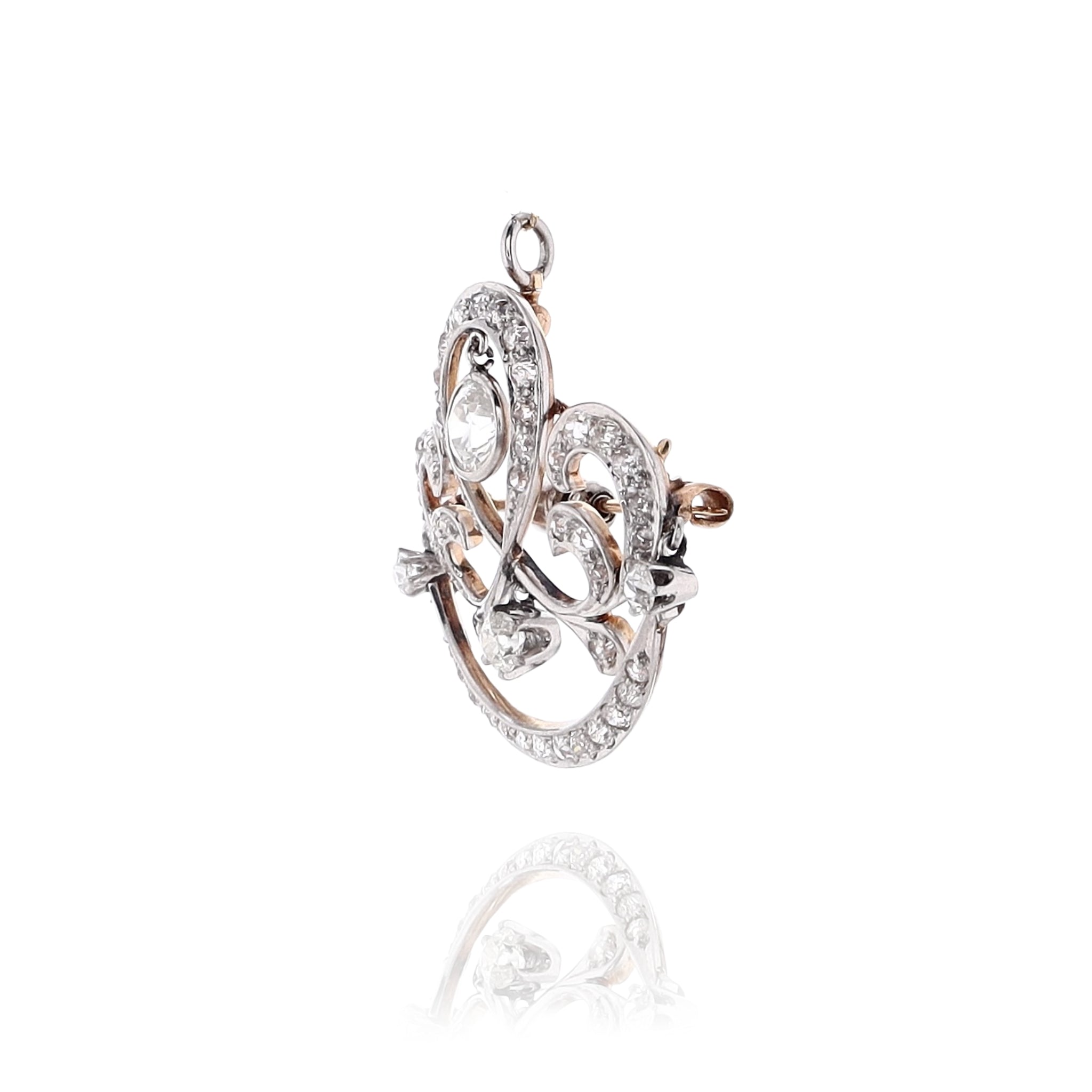 Elegant Estate 14 Karat Yellow Gold and Platinum Scroll Design Diamond Brooch for Fashion Accessorizing