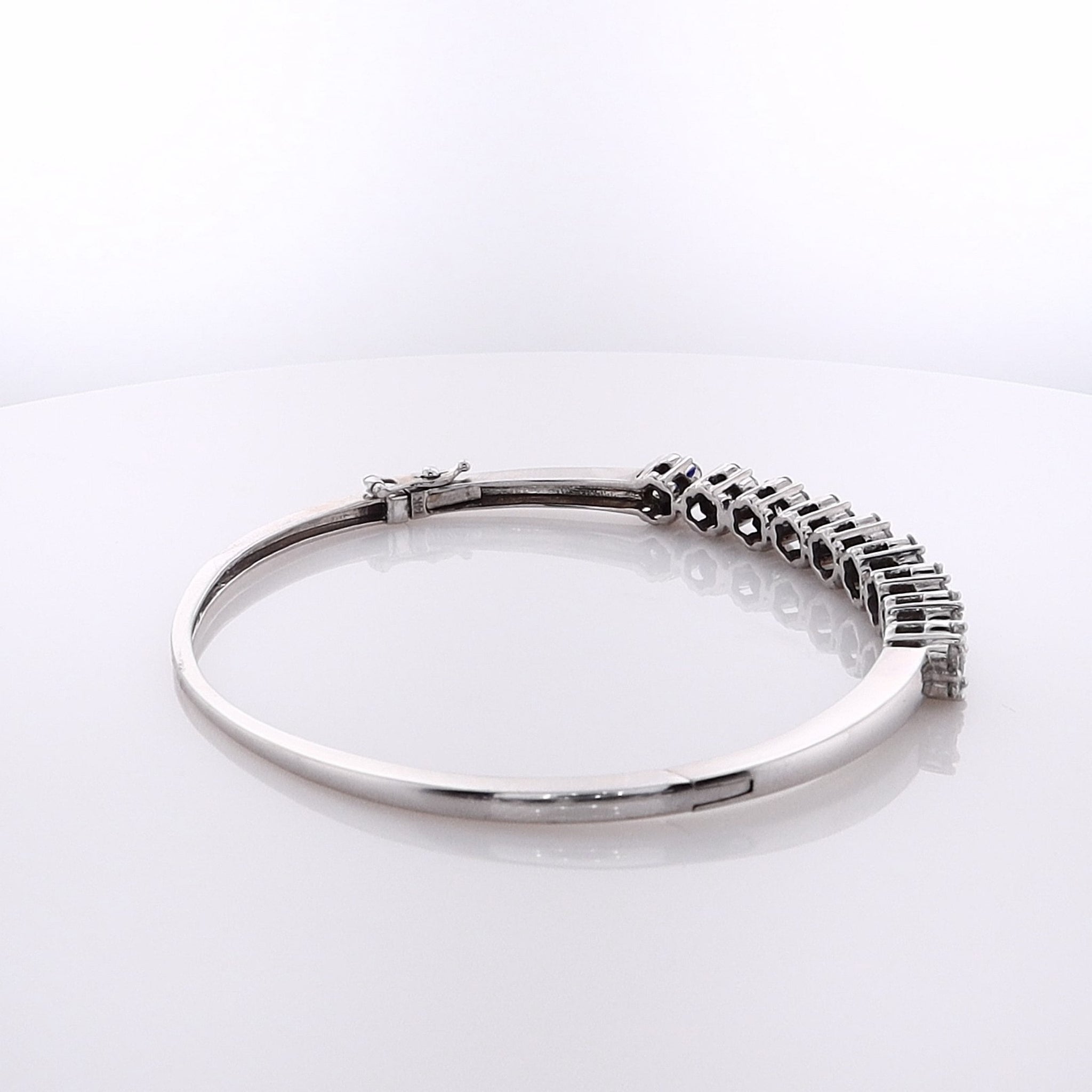 14 Karat White Gold Elegant Hinged Diamond Bangle Bracelet for Timeless Style
