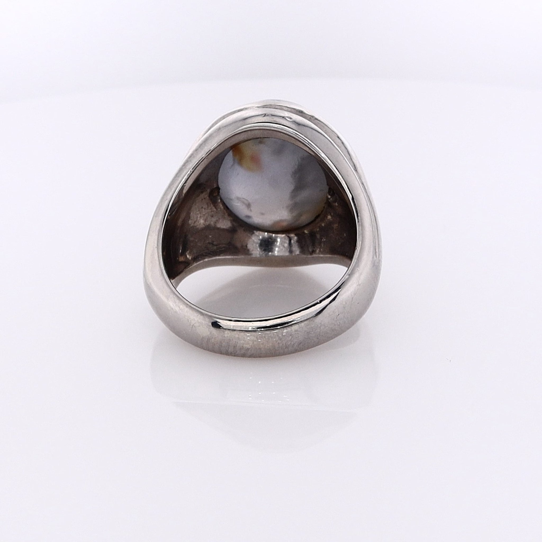 Luxurious 14k White Gold Estate Ring Featuring Oval Cabochon Sapphire and Sparkling Diamonds