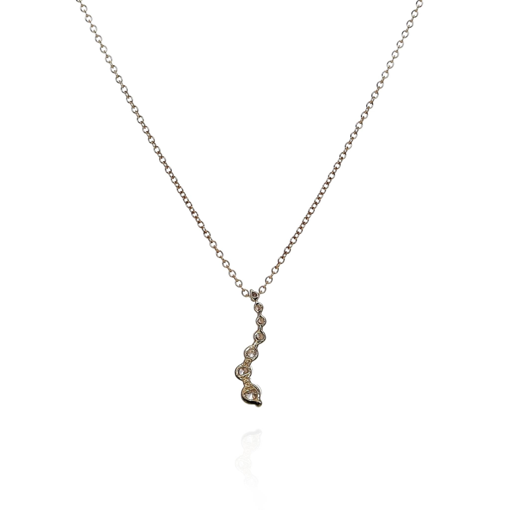 14k Yellow Gold S - Shaped Diamond Pendant for a Stunning Journey