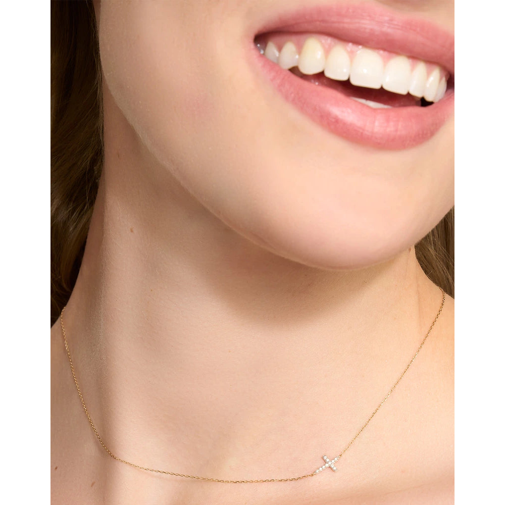 14k Gold Strand Cross Necklace with White Diamond, a Timeless Keepsake