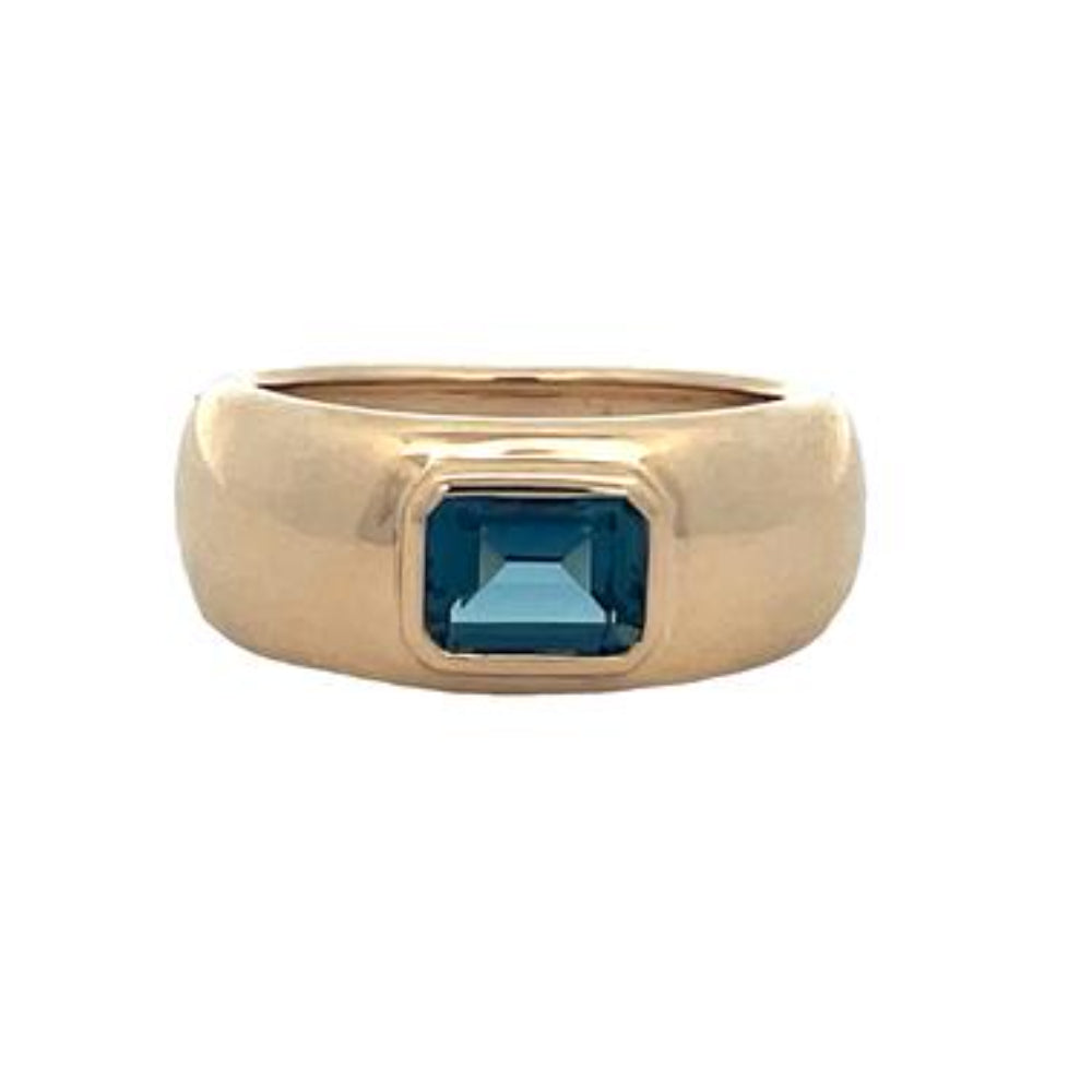 Stunning 14k Gold Ring with a Blue Topaz Dome Design