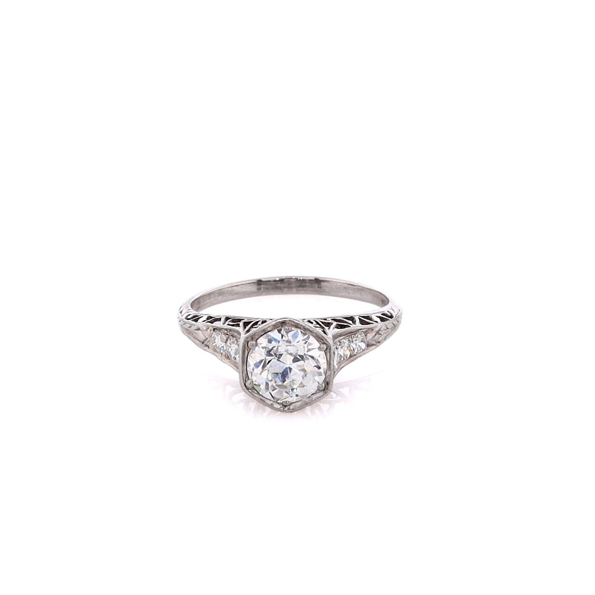 Exquisite Estate Platinum Diamond Engagement Ring with Hexagonal Head and Intricately Engraved Shank