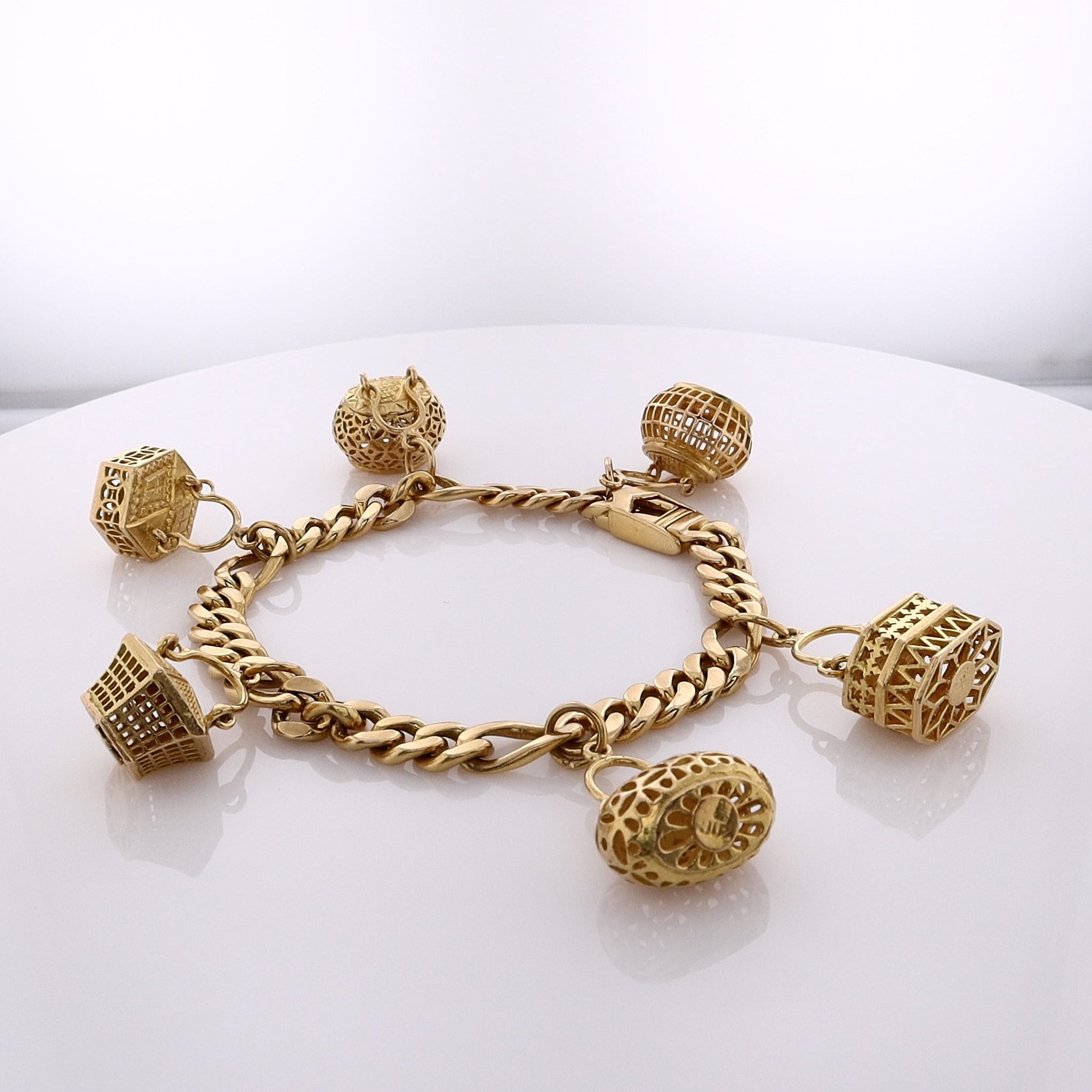 22 Karat Estate Yellow Gold Figaro Chain Bracelet with 6 Assorted Hanging Baskets