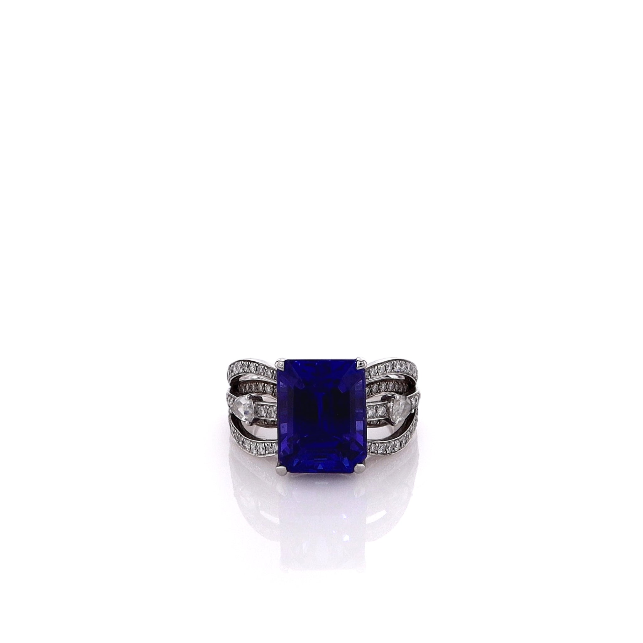 Exquisite 18k White Gold Estate Split Shank Ring Featuring Emerald-Cut Tanzanite and Sparkling Diamonds