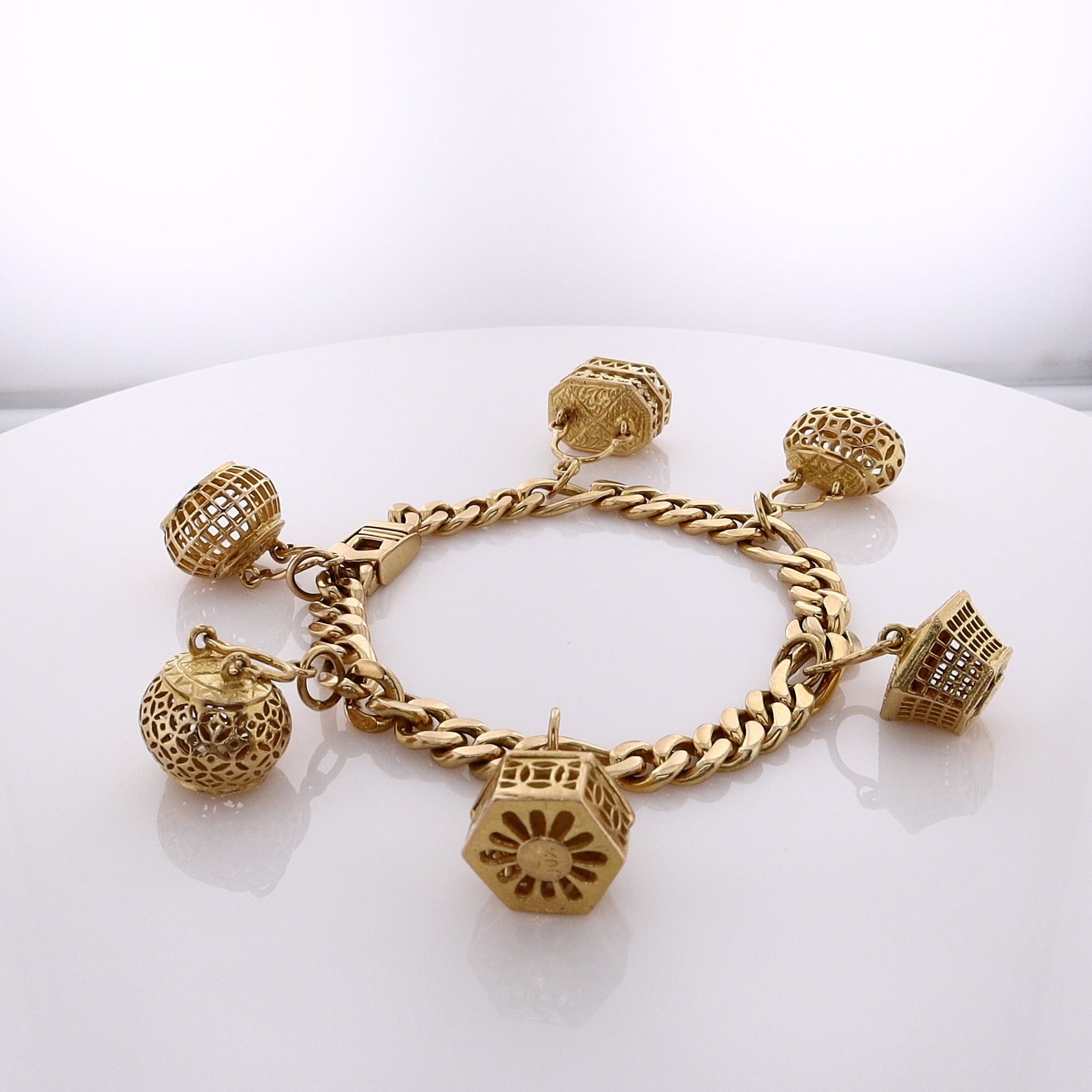 22 Karat Estate Yellow Gold Figaro Chain Bracelet with 6 Assorted Hanging Baskets