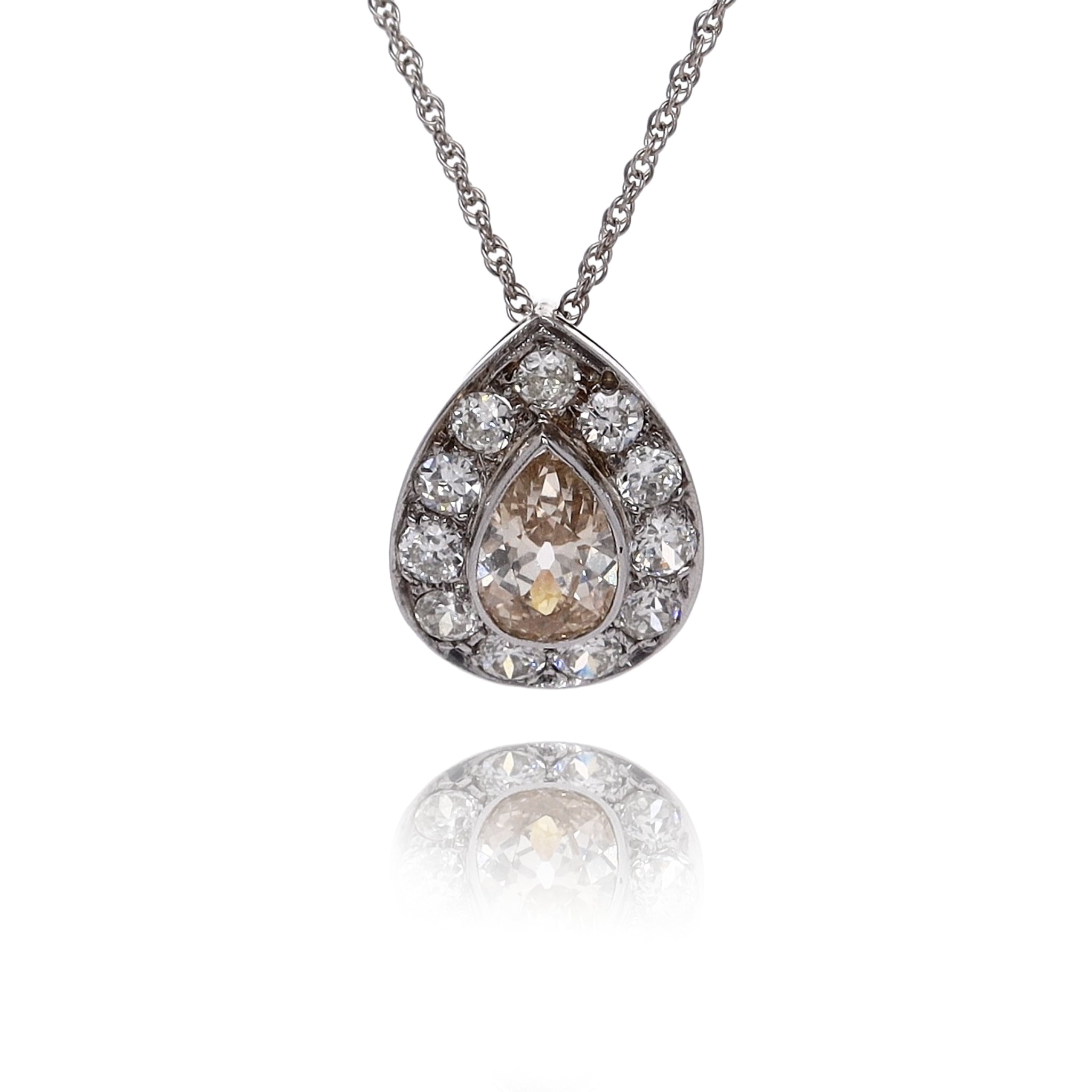 14 Karat White Gold Pear - Shaped Diamond Pendant with Round Brilliant Cut Diamond Surround Necklace