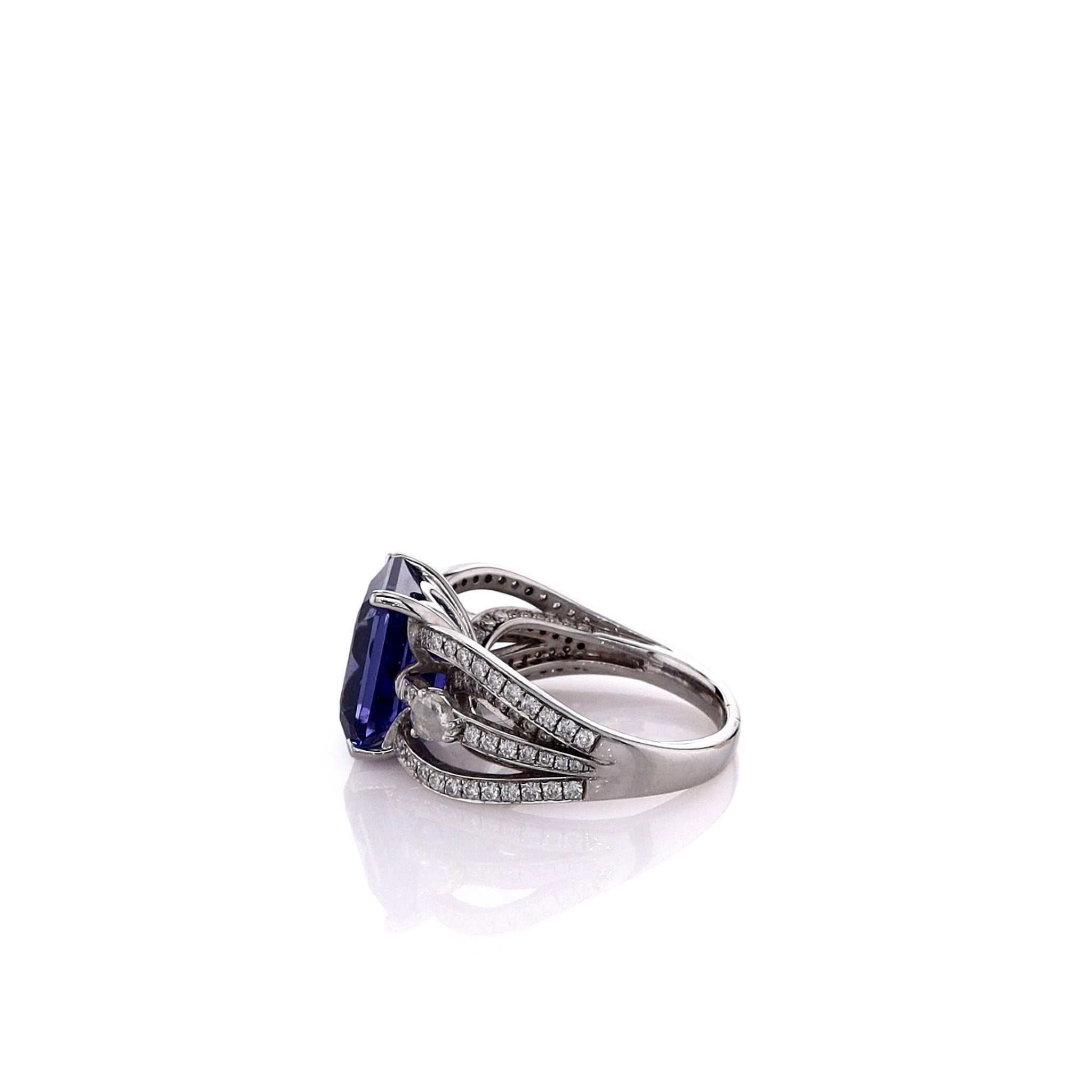 Exquisite 18k White Gold Estate Split Shank Ring Featuring Emerald-Cut Tanzanite and Sparkling Diamonds