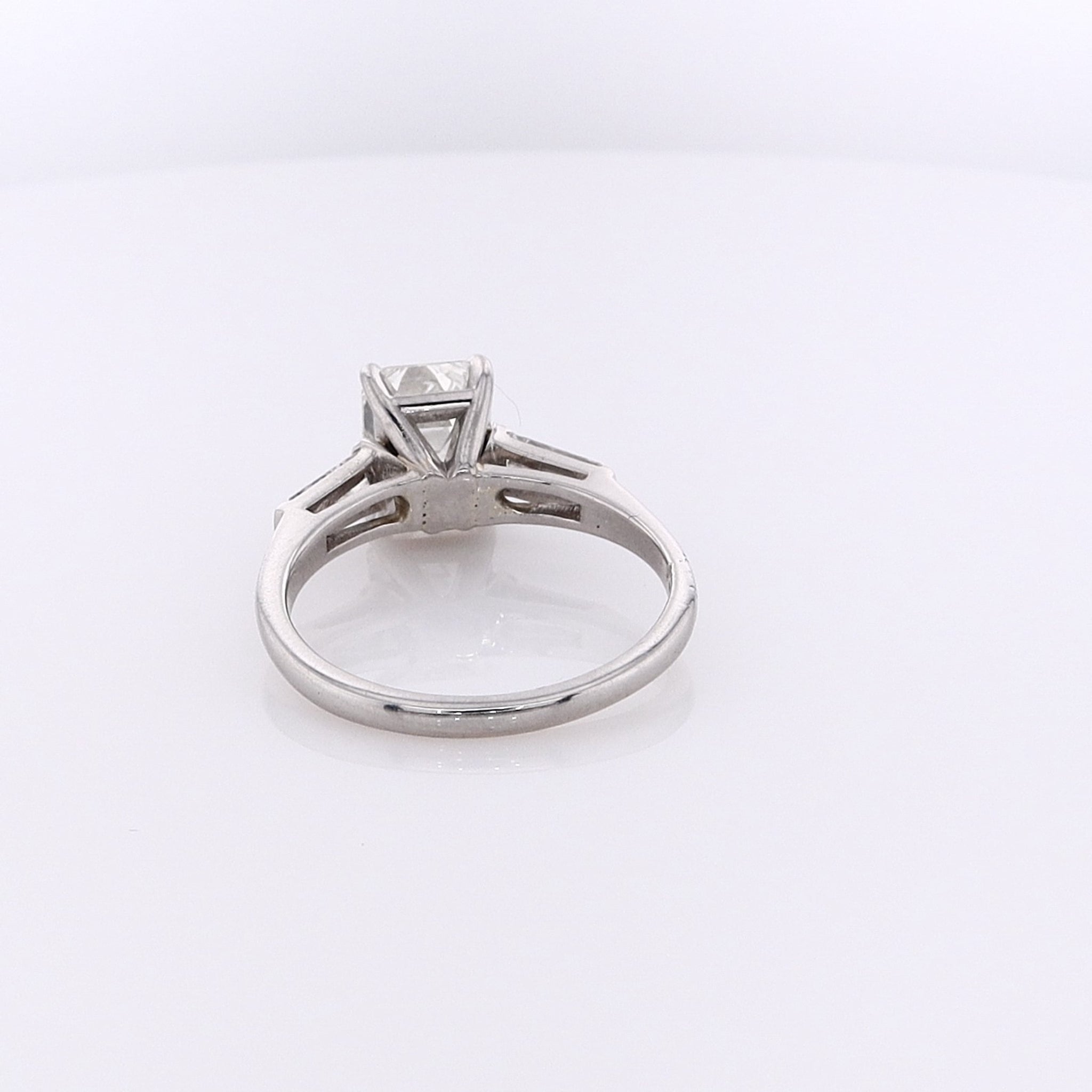 Exquisite Estate Platinum Diamond Engagement Ring Featuring a GIA Certified Emerald Cut Diamond #5231235374 and Two Tapered Baguette Diamonds