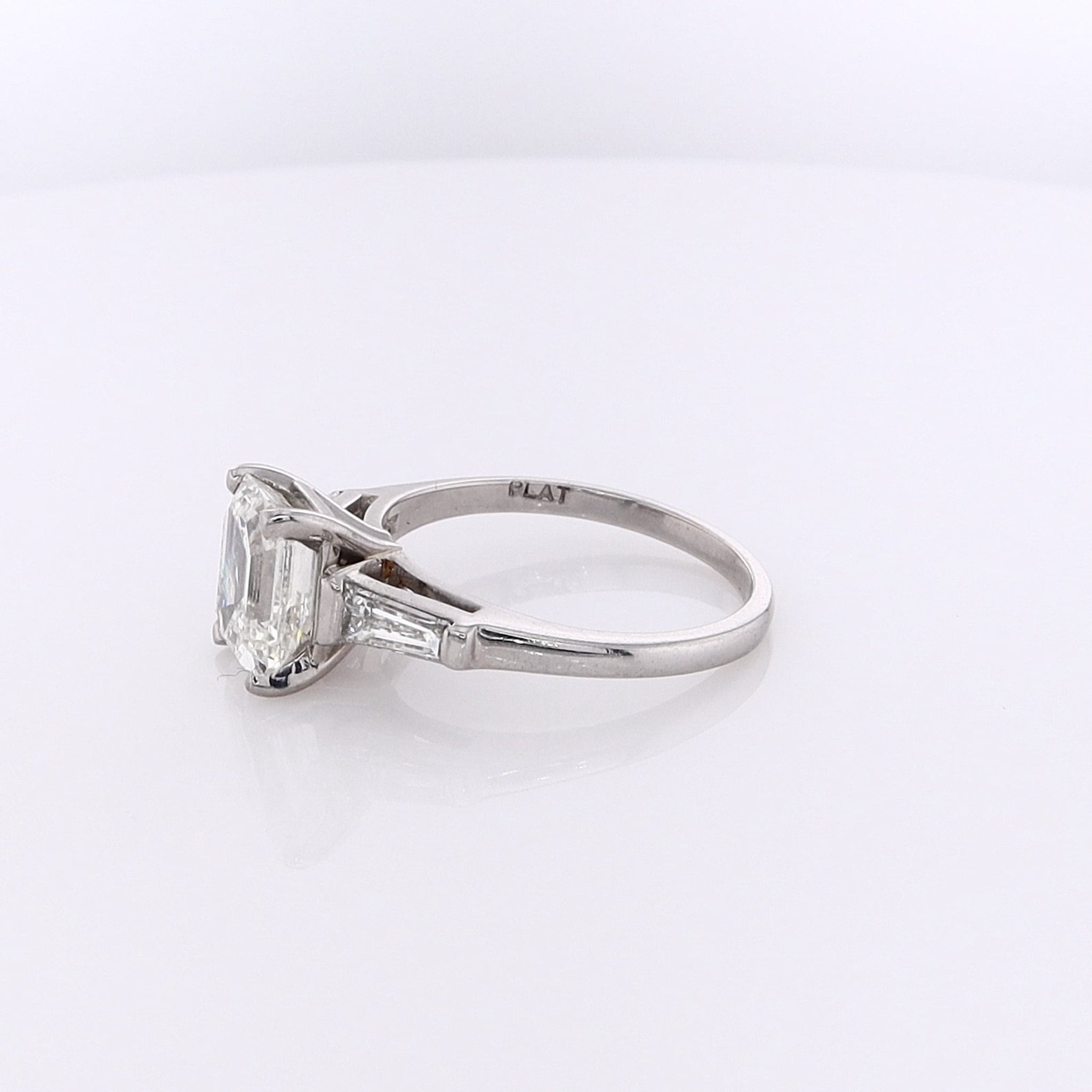 Exquisite Estate Platinum Diamond Engagement Ring Featuring a GIA Certified Emerald Cut Diamond #5231235374 and Two Tapered Baguette Diamonds