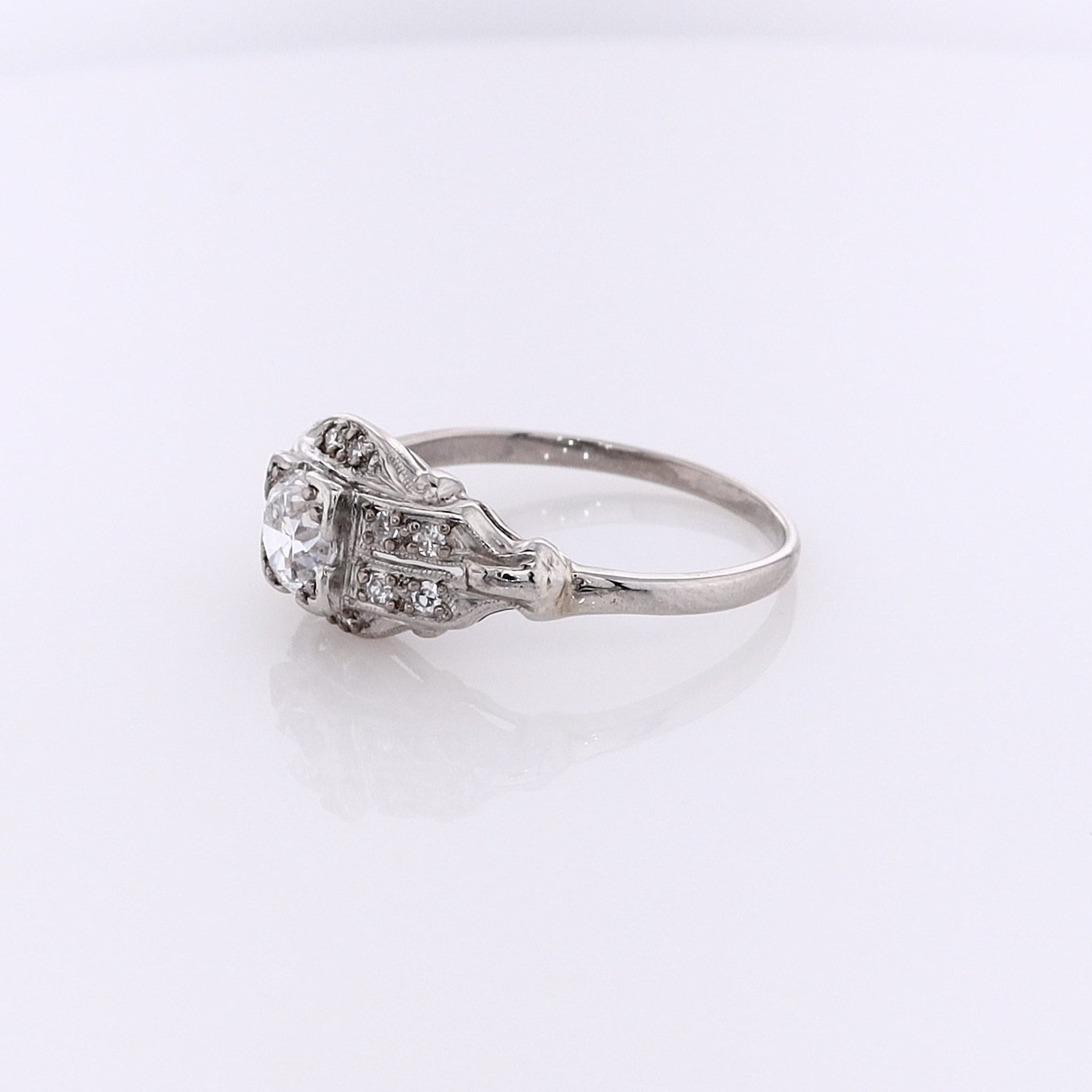 Luxurious Estate Platinum Diamond Engagement Ring with Old European and Single Cut Diamonds
