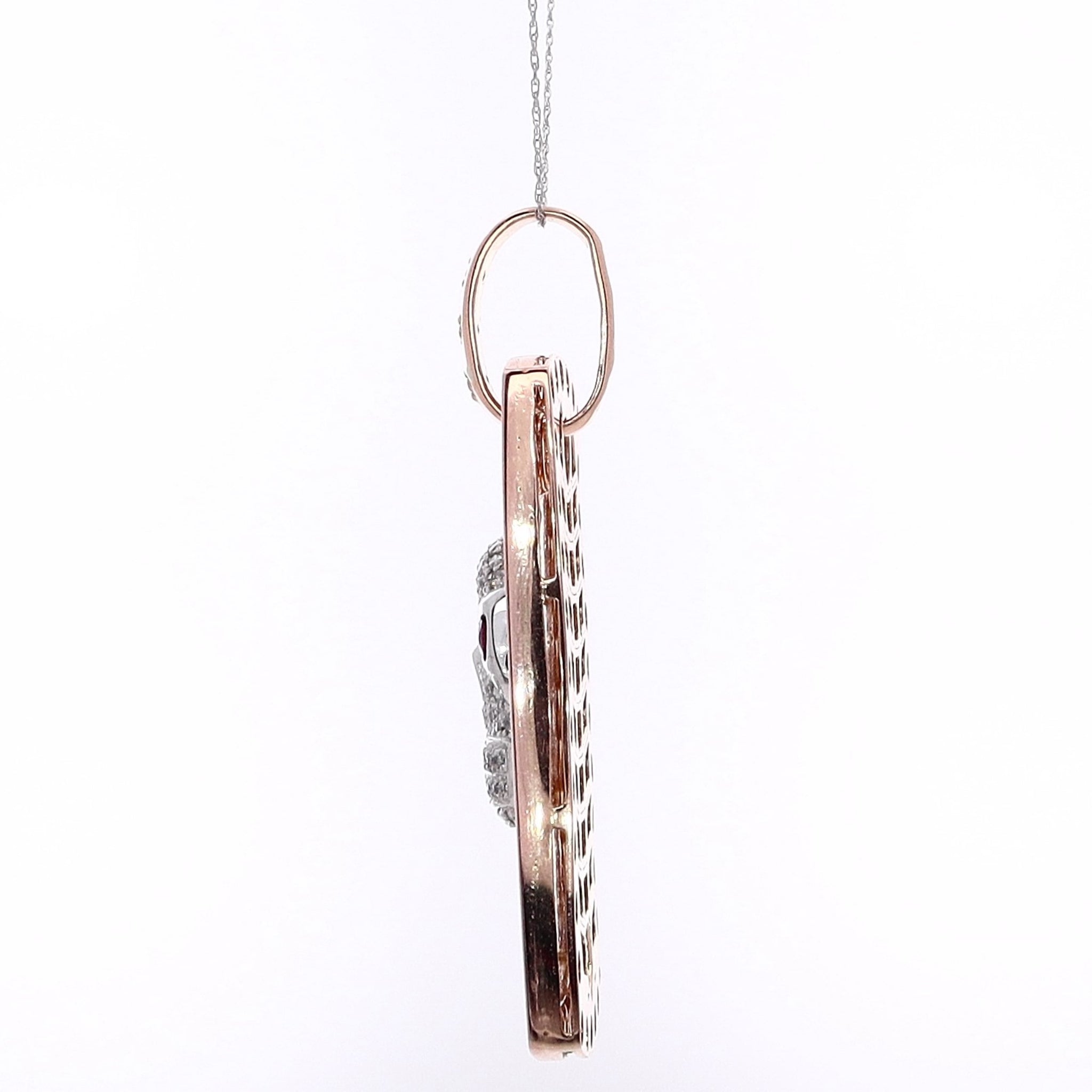 14K White and Rose Gold Dog Tag Skull Pendant with 2 Round Garnet Eyes and 97 Diamonds