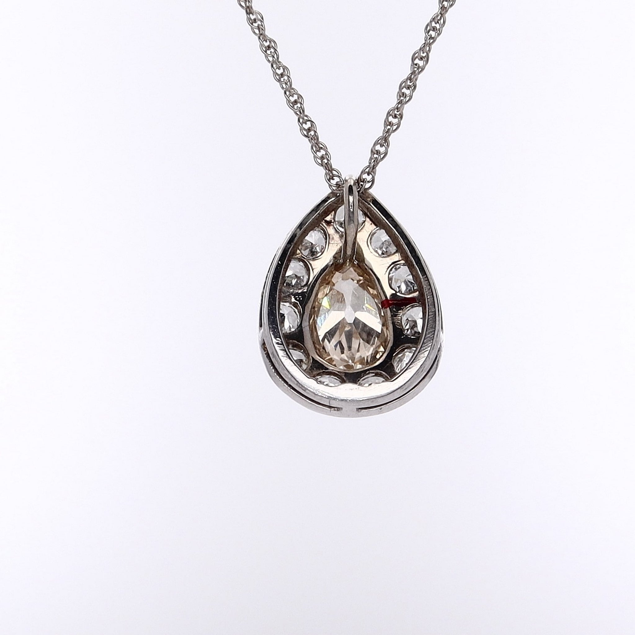 14 Karat White Gold Pear - Shaped Diamond Pendant with Round Brilliant Cut Diamond Surround Necklace