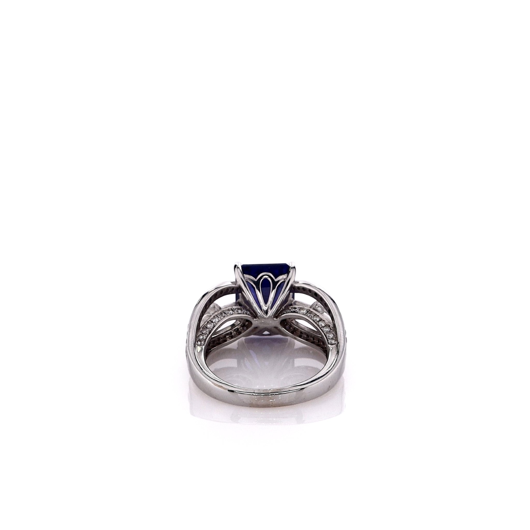 Exquisite 18k White Gold Estate Split Shank Ring Featuring Emerald-Cut Tanzanite and Sparkling Diamonds